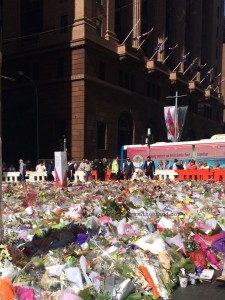 A Muslim bride lays her bridal bouquet at the flower memorial at Martin Place in Sydney. Site of the Lindt Cafe siege. 